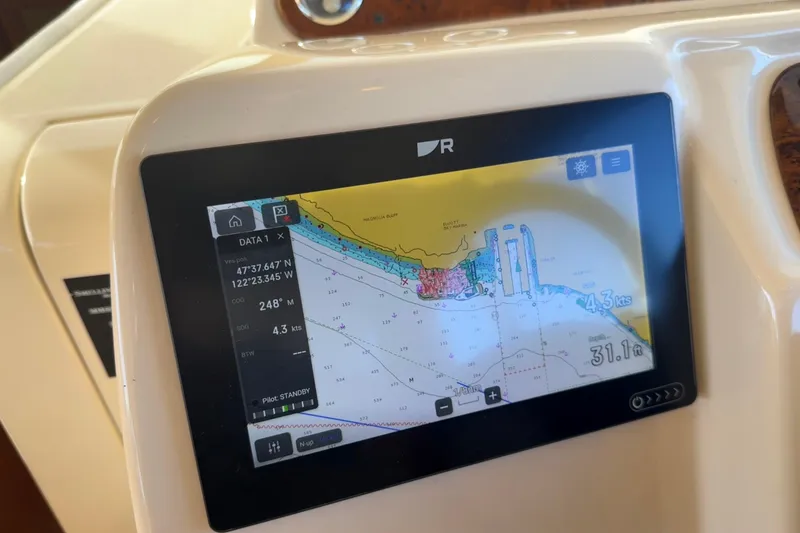 Slide: The Image of Navigation display on 2004 Meridian 411 Sedan showing coordinates and speed. - 30