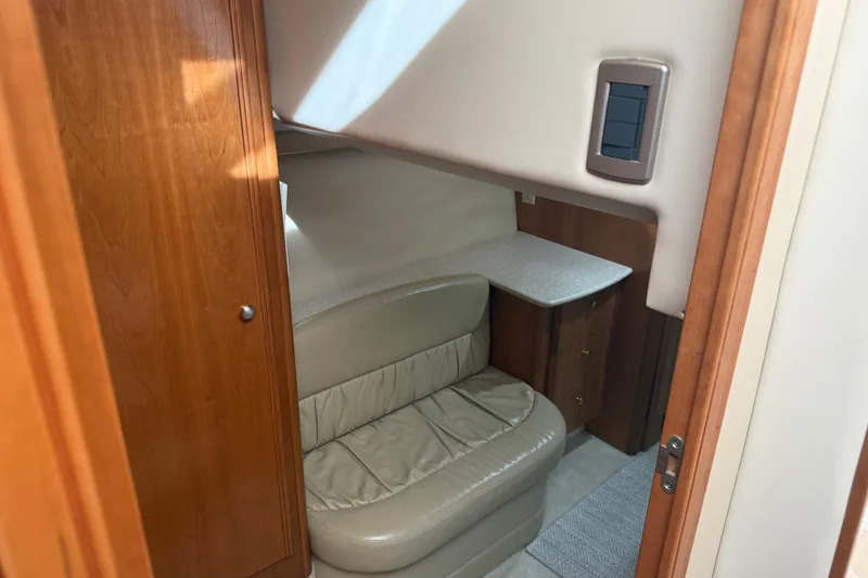 Slide: The Image of Interior of 2004 Meridian 411 Sedan with leather seating and wooden cabinetry. - 59
