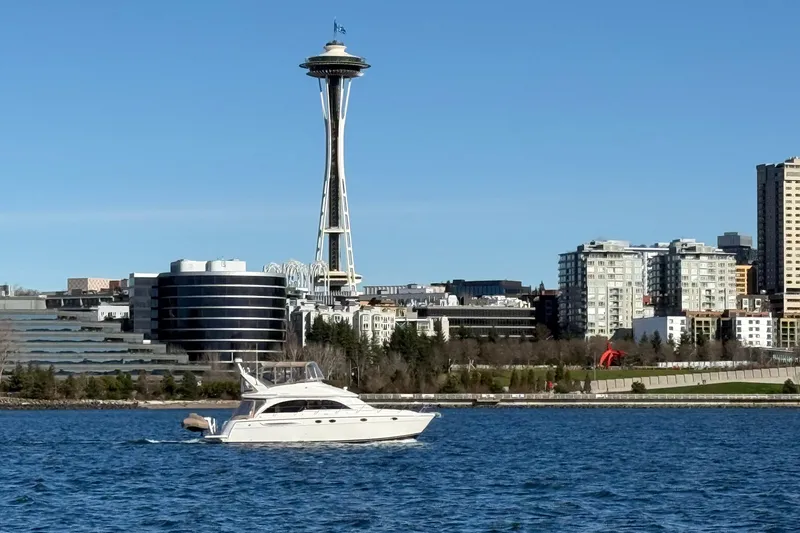 Slide: The Image of 2004 Meridian 411 Sedan yacht cruising near Seattle's Space Needle on a sunny day. - 6