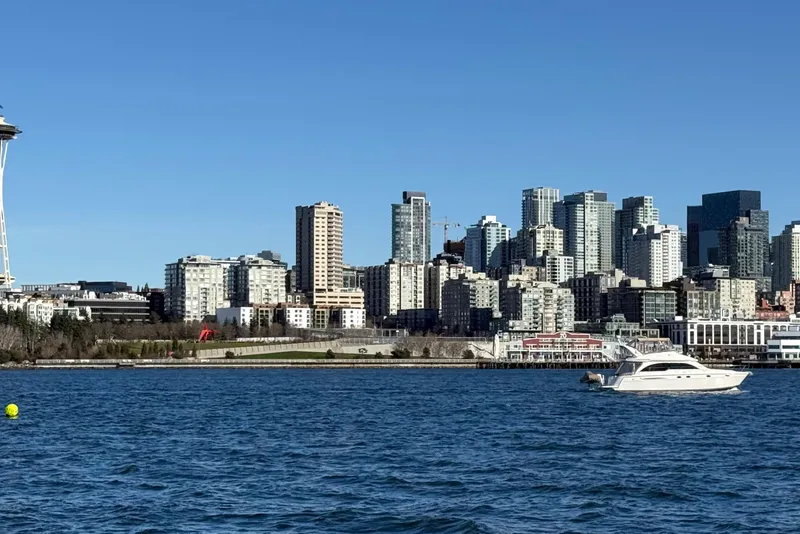 Slide: The Image of 2004 Meridian 411 Sedan yacht on Seattle waterfront with skyline and Space Needle. - 7
