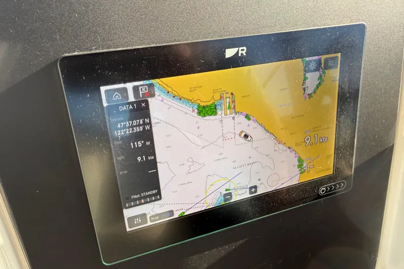 Slide: The Image of Navigation display on 2004 Meridian 411 Sedan showing nautical chart and speed. - 80