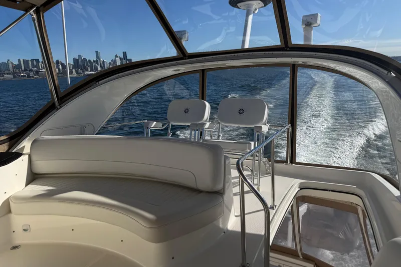 Slide: The Image of 2004 Meridian 411 Sedan interior with city skyline and ocean view. - 87