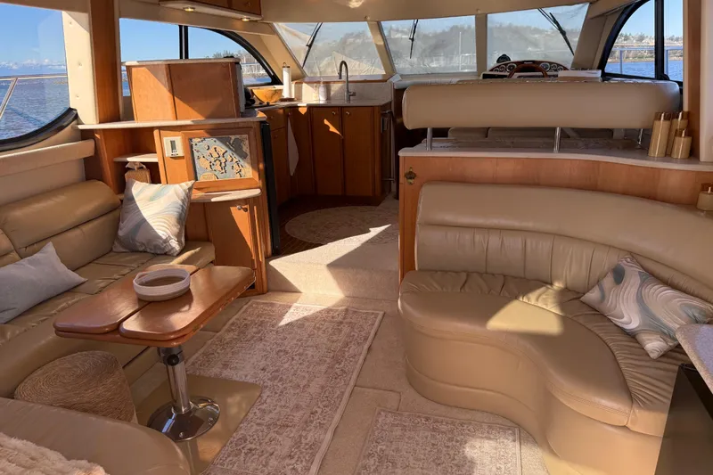 Slide: The Image of Luxurious interior of a 2004 Meridian 411 Sedan yacht with leather seating and elegant decor. - 9