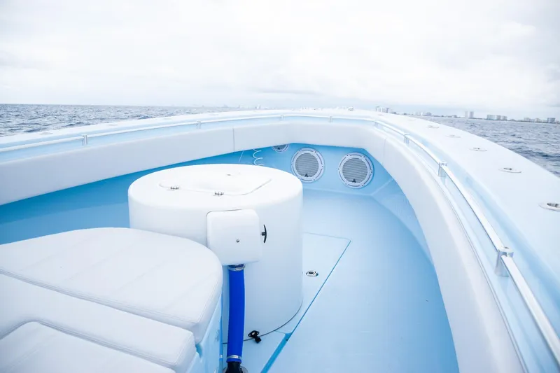 Slide: The Image of Contender 44 ST 2026 boat on open sea, interior view. - 16