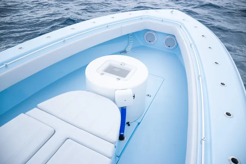 Slide: The Image of Interior view of 2026 Contender 44 ST boat on the water. - 17