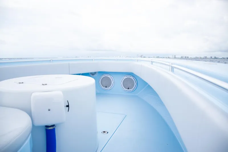 Slide: The Image of Contender 44 ST 2026 boat deck with ocean and city skyline view. - 18