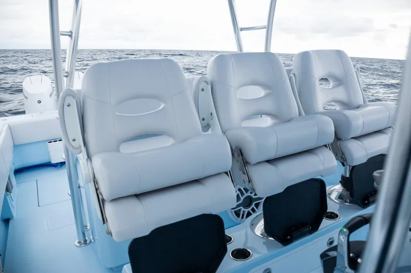 Slide: The Image of Luxury seating on 2026 Contender 44 ST boat, ocean backdrop. - 28