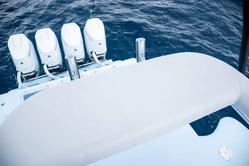 Slide: The Image of Contender 44 ST 2026 with four outboard engines on open sea. - 35