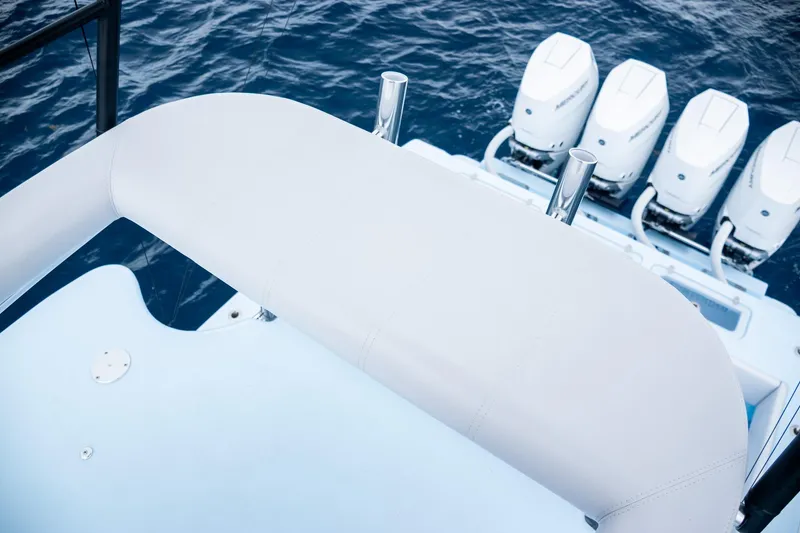 Slide: The Image of Contender 44 ST 2026 with four outboard engines on open sea. - 36