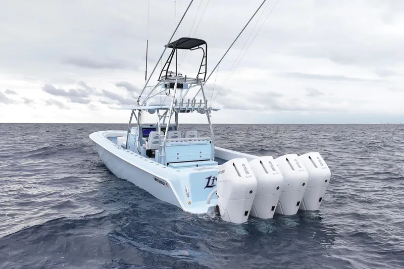 Slide: The Image of 2026 Contender 44 ST boat cruising on open ocean under cloudy sky. - 4