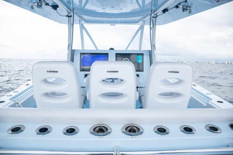 Slide: The Image of Interior view of 2026 Contender 44 ST with modern helm console. - 44