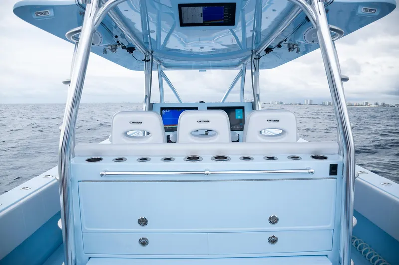 Slide: The Image of Interior view of 2026 Contender 44 ST boat on open sea. - 46