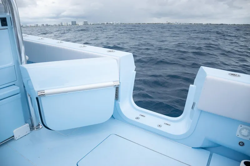 Slide: The Image of Contender 44 ST 2026 boat with open transom on the ocean. - 47