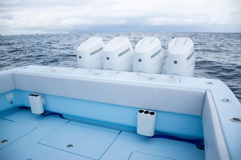 Slide: The Image of Contender 44 ST 2026 with four Mercury engines on open sea. - 50