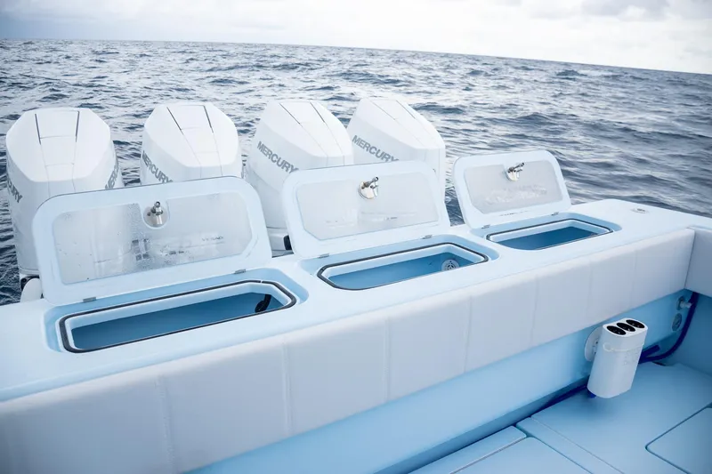 Slide: The Image of Contender 44 ST 2026 with four Mercury engines on open sea. - 55