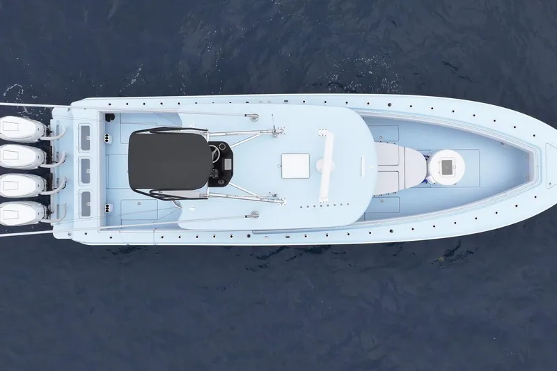 Slide: The Image of Aerial view of 2026 Contender 44 ST boat on open water. - 9