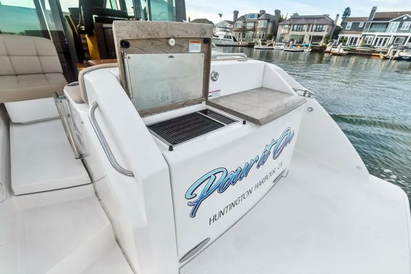 Slide: The Image of 2017 Tiara Yachts C39 Coupe with outdoor grill, docked at Huntington Harbour. - 23