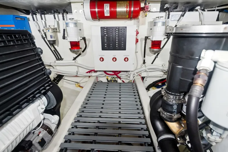 Slide: The Image of Engine room of 2017 Tiara Yachts C39 Coupe, showcasing mechanical components and systems. - 28