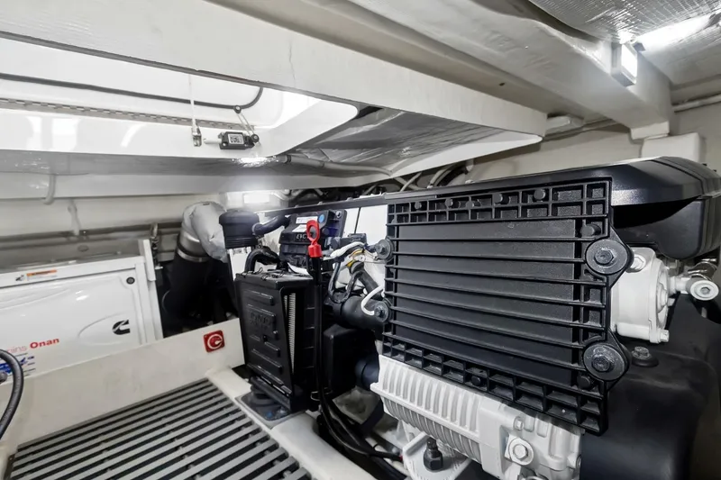 Slide: The Image of Engine room of 2017 Tiara Yachts C39 Coupe, showcasing mechanical components and equipment. - 30