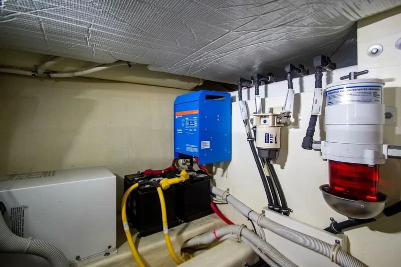 Slide: The Image of Engine room of 2017 Tiara Yachts C39 Coupe with electrical and fuel systems. - 33