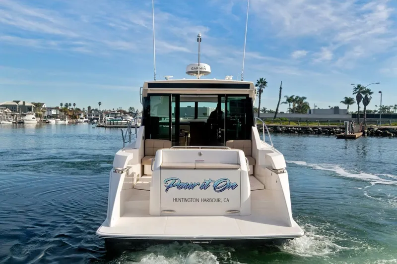 Slide: The Image of 2017 Tiara Yachts C39 Coupe in Huntington Harbour, CA, cruising on a sunny day. - 38