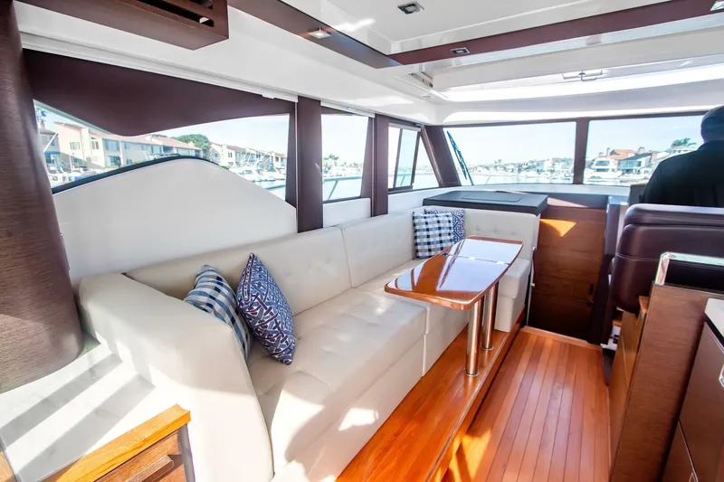 Slide: The Image of Luxurious interior of 2017 Tiara Yachts C39 Coupe with elegant seating and wooden accents. - 5