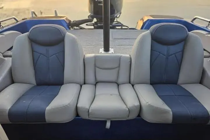 Slide: The Image of 2017 Skeeter SL 190 boat seats, blue and gray upholstery, rear view. - 11