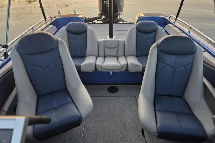 Slide: The Image of 2017 Skeeter SL 190 boat interior with blue and gray seating arrangement. - 15