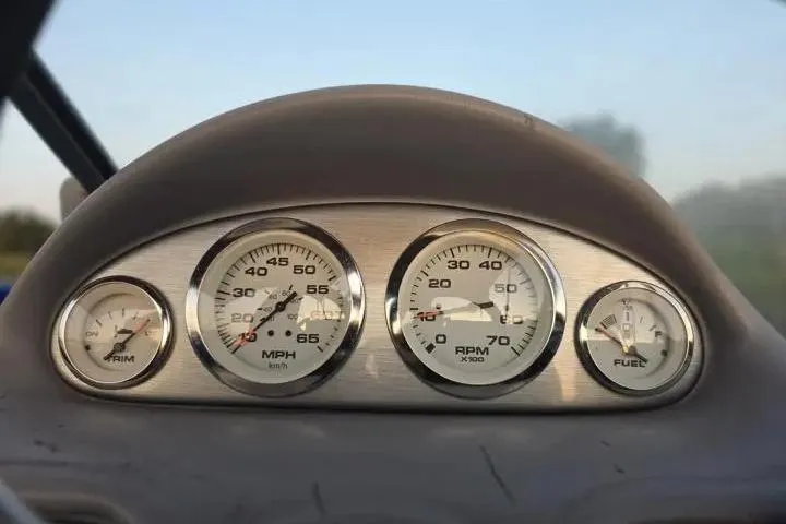 Slide: The Image of Dashboard of a 2017 Skeeter SL 190 boat with speedometer and fuel gauges. - 33