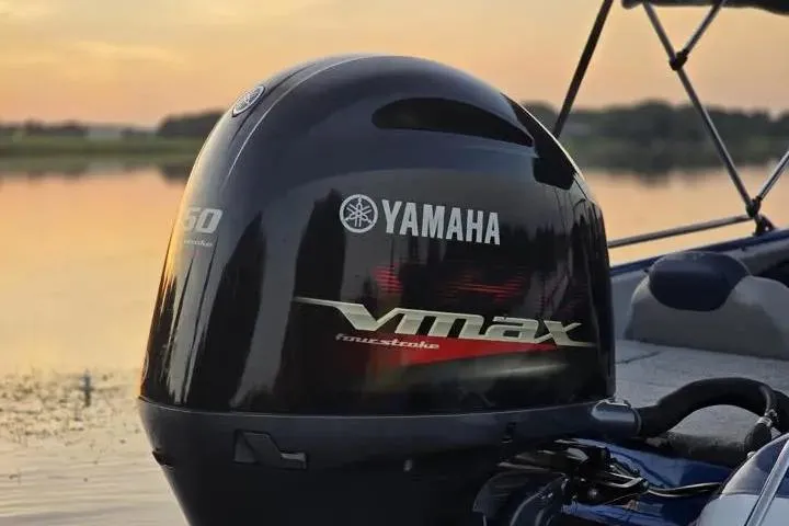 Slide: The Image of 2017 Skeeter SL 190 with Yamaha VMAX outboard engine at sunset on a lake. - 5