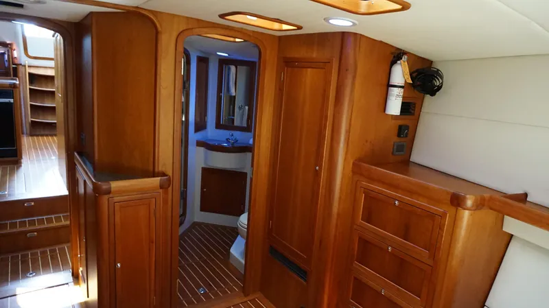 Slide: The Image of Interior of a 2007 Reichel/Pugh yacht with wooden furnishings. - 13