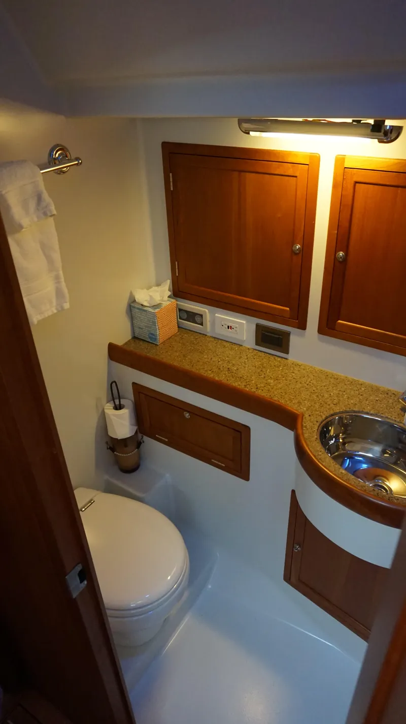 Slide: The Image of Compact bathroom in a 2007 Reichel/Pugh yacht. - 18