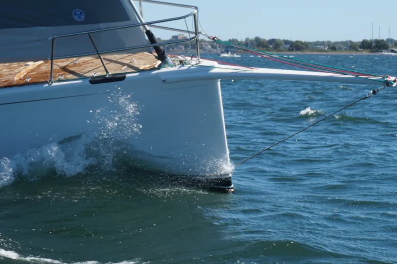 Slide: The Image of Reichel/Pugh 2007 yacht sailing on calm waters. - 20