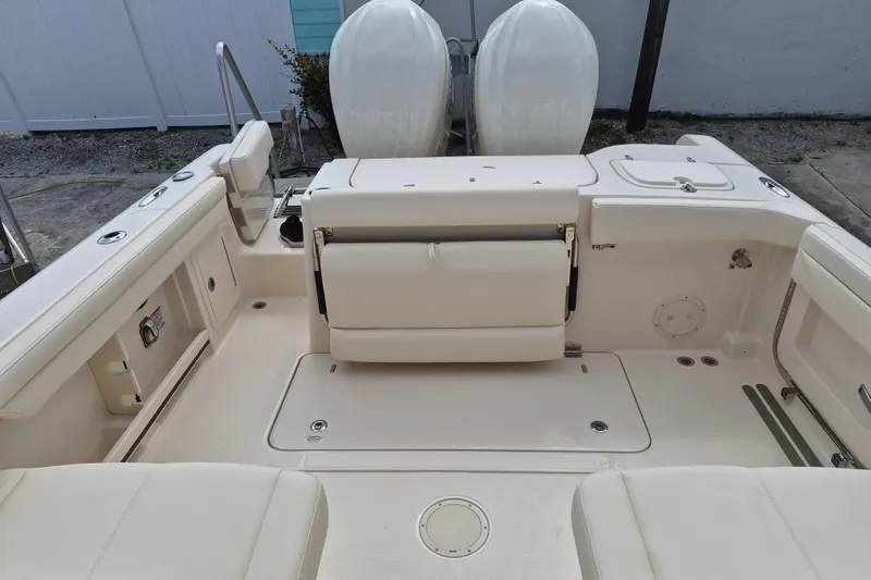 Slide: The Image of 2026 Grady-White Freedom 285 boat interior with seating and storage compartments. - 20