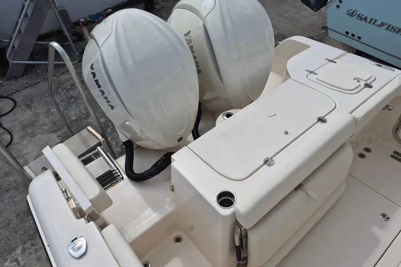 Slide: The Image of 2026 Grady-White Freedom 285 boat with dual Yamaha outboard engines. - 22