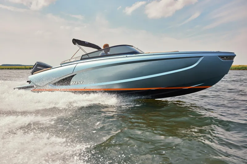 Slide: The Image of 2026 Flynt Yachts Speedera 26 OB cruising on water, showcasing sleek design and performance. - 3
