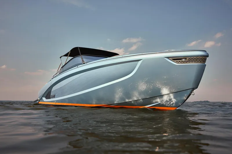 Slide: The Image of 2026 Flynt Yachts Speedera 26 OB on water, sleek design, blue sky background. - 4