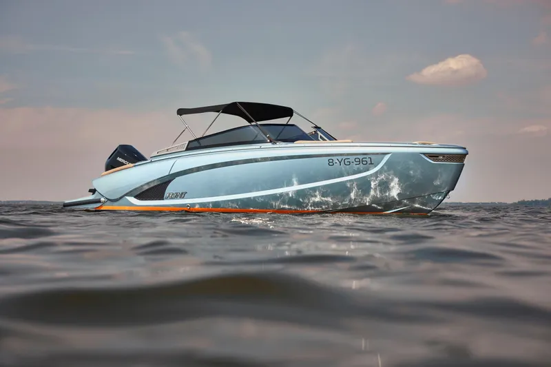 Slide: The Image of 2026 Flynt Yachts Speedera 26 OB on water, showcasing sleek design and modern features. - 5