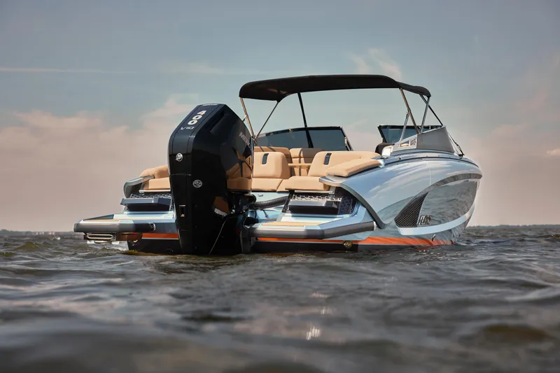 Slide: The Image of 2026 Flynt Yachts Speedera 26 OB on water, showcasing sleek design and powerful engine. - 6