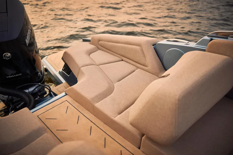 Slide: The Image of Luxurious seating on 2026 Flynt Yachts Speedera 26 OB, overlooking serene waters. - 8