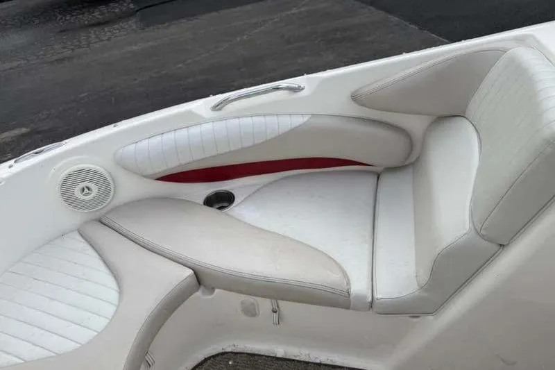 Slide: The Image of 2007 Glastron GXL 205 boat interior with white and red seating. - 15