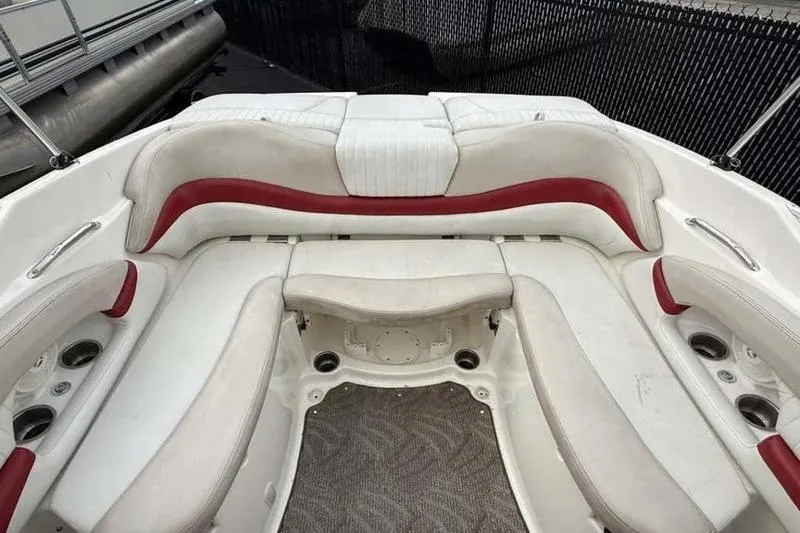 Slide: The Image of 2007 Glastron GXL 205 boat interior with white and red seating. - 6