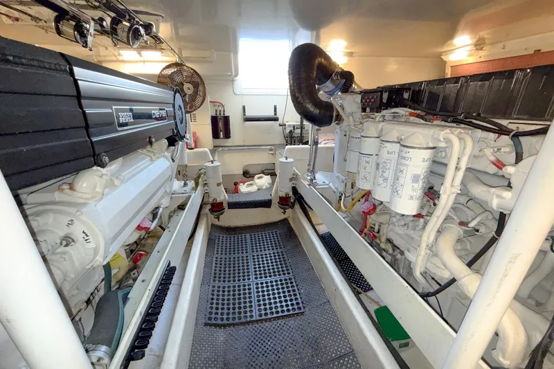Slide: The Image of Engine room of 2004 Silverton 48 Convertible yacht with Volvo Penta engines. - 77