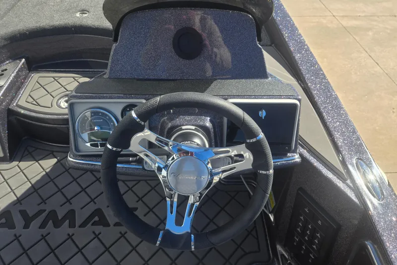 Slide: The Image of Steering wheel and dashboard of 2026 Caymas CX 21 PRO boat. - 10