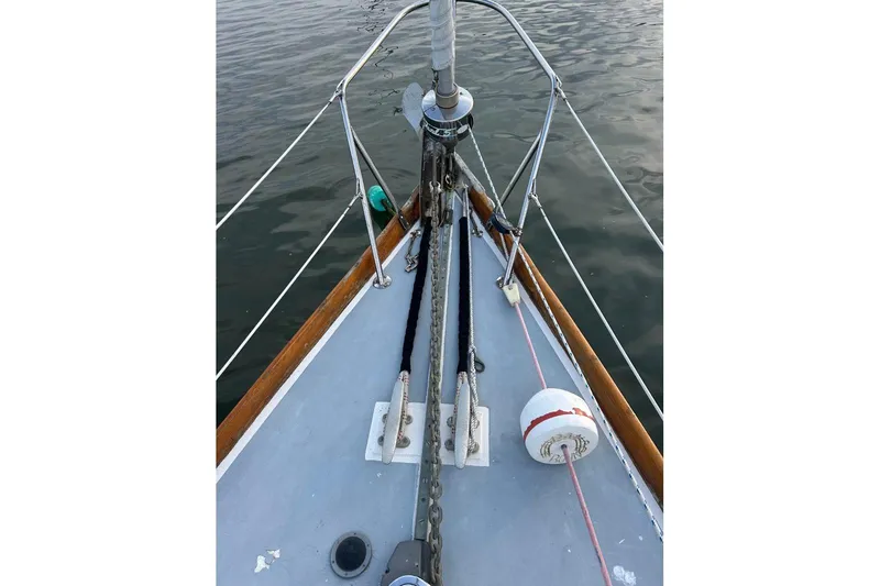 Slide: The Image of Bow of a 1969 Tartan 37 sailboat with ropes and anchor chain. - 10