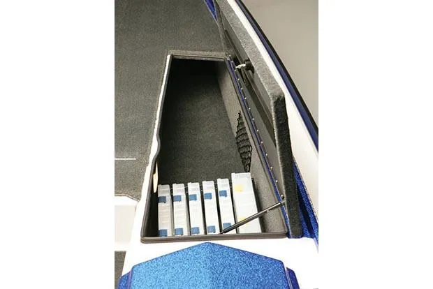 Slide: The Image of Red 2021 Bullet 21XRD boat on trailer in outdoor lot. - 3