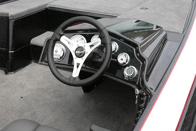 Slide: The Image of 2021 Bullet 21XRD boat with powerful engine, parked on a trailer in a lot. - 5