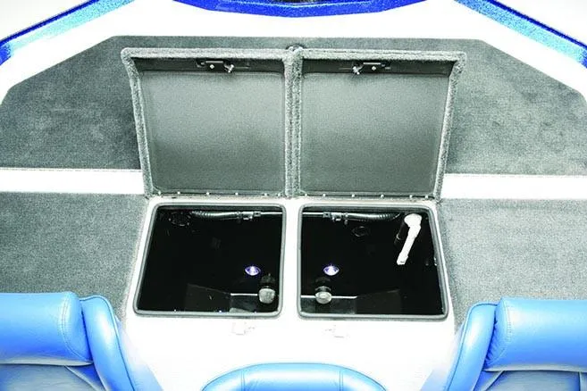 Slide: The Image of 2021 Bullet 21XRD boat with powerful outboard motor, parked on a sunny day. - 6