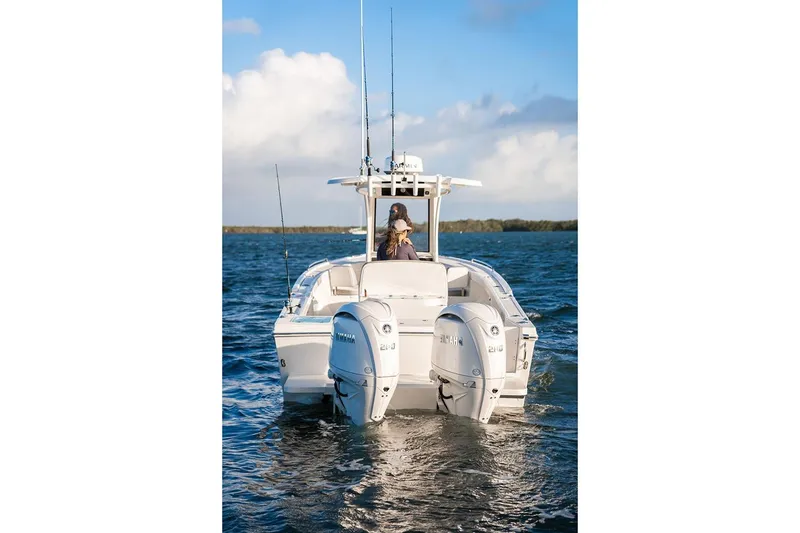 Slide: The Image of Manufacturer Provided Image: 2026 Parker 274 Fathom boat on water, featuring dual Yamaha outboard engines. - 4
