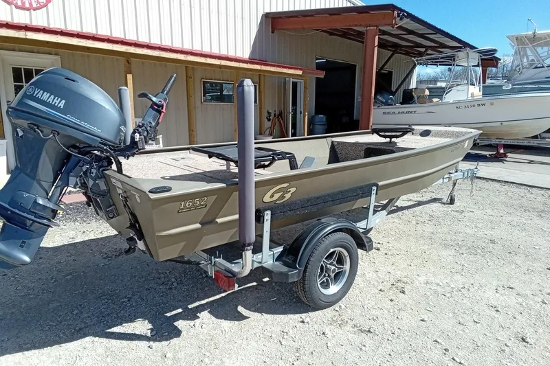 Slide: The Image of 2024 G3 Gator Tough 1652 VBW boat with Yamaha motor on trailer. - 15